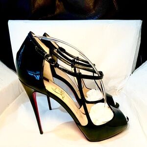 Christian Louboutin caged ankle strap peeptoe pumps. Glossy patent black 38.5